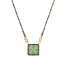 ARROW (onyx vert, émail violet et lien en soie)